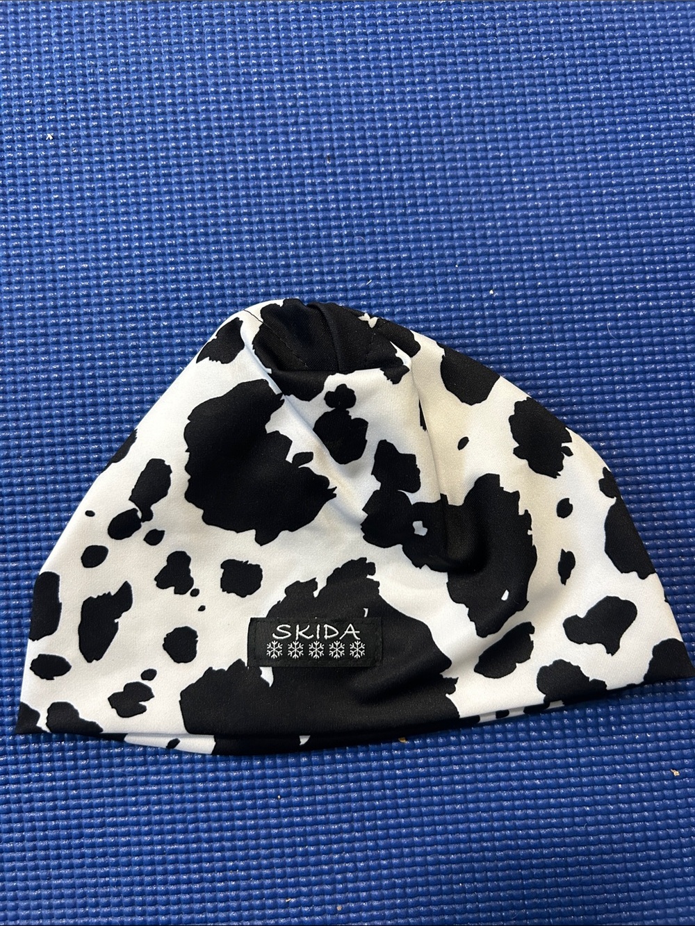 Skida Nordic Women’s Black & White Cow Print Beanie